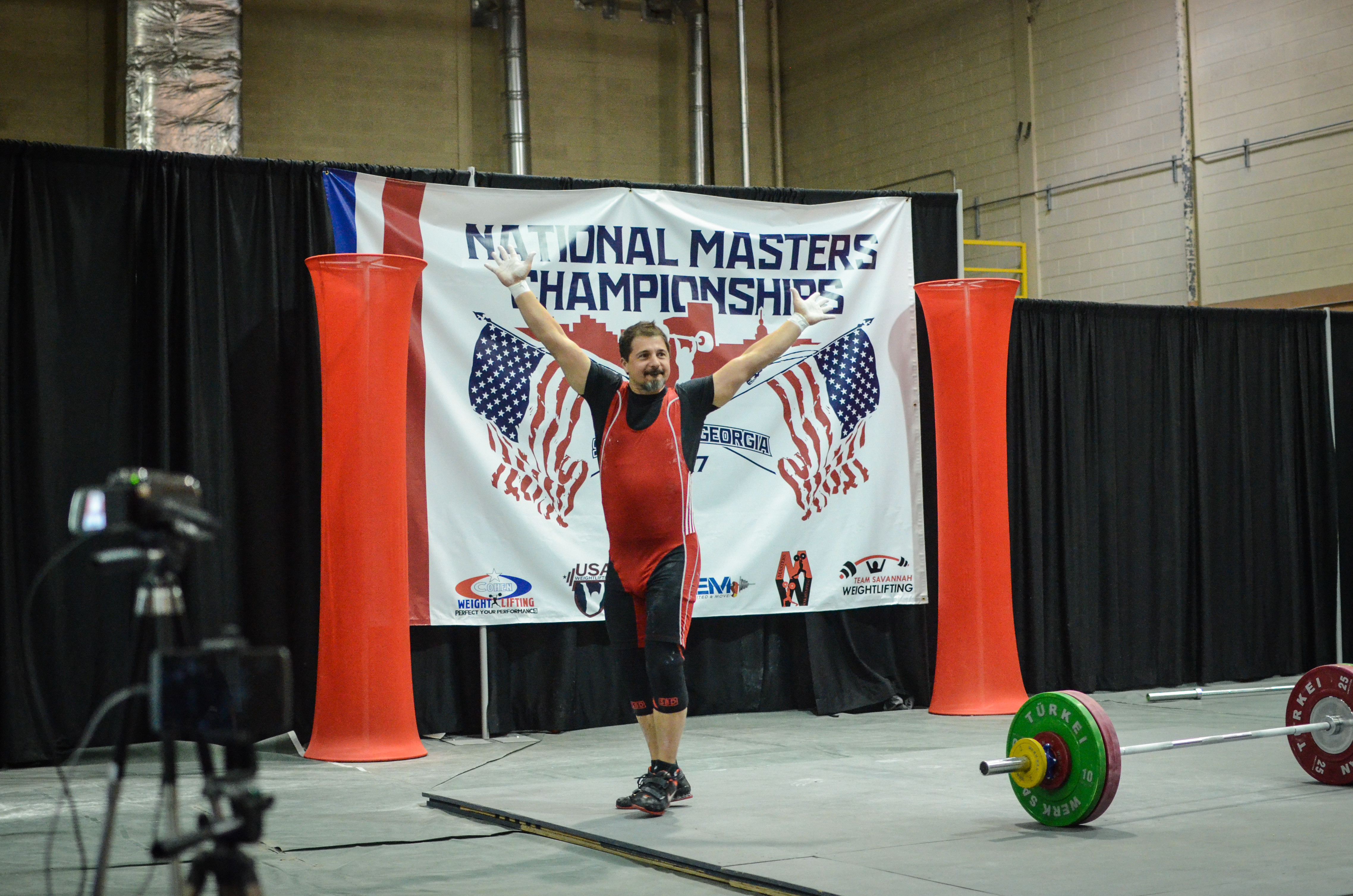 Masters athlete celebrating championship victory